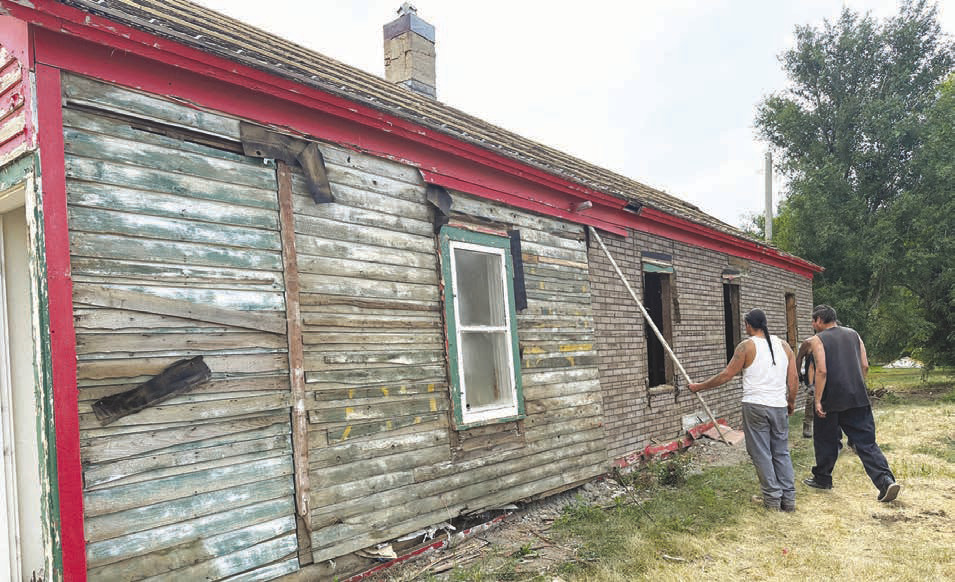 Richard “Bubba” Smith and his crew tore down the former Dewey County Sheriff’s residence - all except the concrete portion that housed the county jail. (See below.)