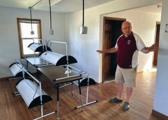 Timber Lake School Supt. Dan Martin inspects the Linderman House after contractors completed converting it into a multi-purpose educational space. Photo by Jon Flatland