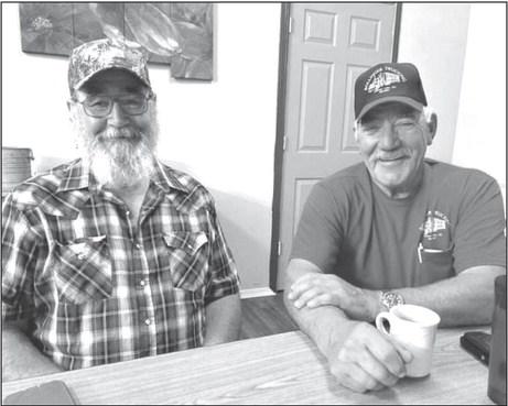 Wade and Tim Bollinger are inviting the public to an open house this Saturday at the Bollinger Trucking shop to celebrate 70 years of service . Over the years, Bollinger trucks have delivered loads to 48 of the 50 states in the U.S. Photo by Jon Flatland