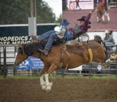 Cooper Schuelke of Faith earned a third place finish in saddle bronc riding at the SD High School Finals Rodeo in Ft. Pierre last week, advancing him to the National High School Finals Rodeo slated July 19-25 in Lincoln, NE. Photo by Chuck Miner