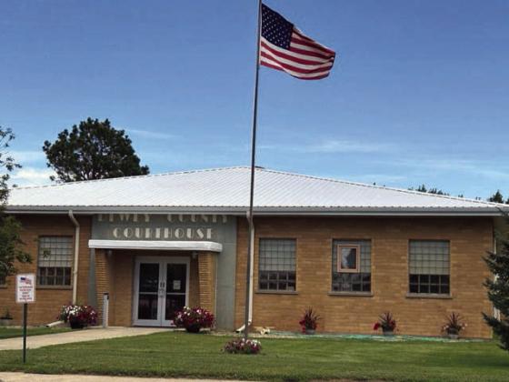 The Dewey County Board of Commissioners has put the replacement of the hail-damaged courthouse roof up for bids for a third time after twice rescinding contracts for the project. Photo by Jon Flatland