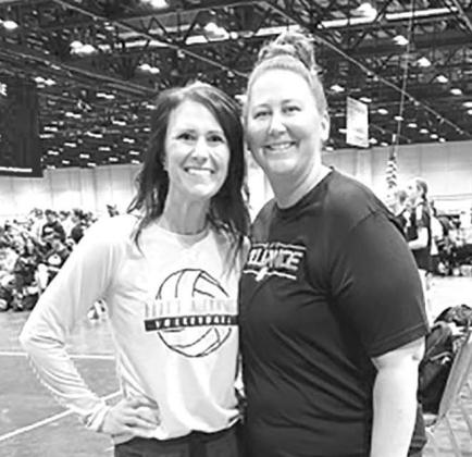 Jillaine Pfeifle Smith (Timber Lake High School Class of 2007) and head coach Ashley Heinrich
