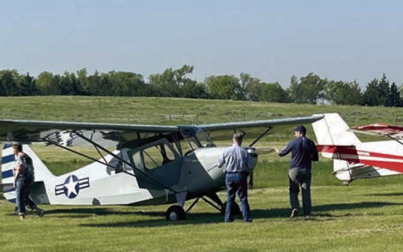 More than a dozen airplanes and helicopters flew into Isabel on Sunday, June 1, for the annual Isabel Airport Fly-In Breakfast. Visiting pilots and the public were treated to a free-will donation pancake and sausage breakfast with all the proceeds going toward airport maintenance and improvements. The Isabel Airport is one of only a few rural airports statewide that offer 24-hour runway lighting when it is open. Photos by Jon Flatland
