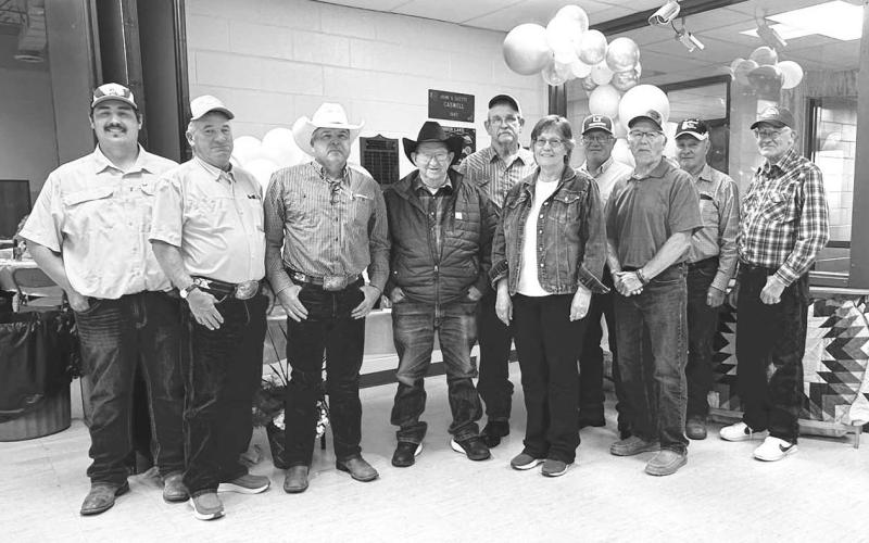 Dewey County Highway Dept. Secretary Cathy Lemburg was honored at a retirement party at Timber Lake on June 19. She was presented with a star quilt and other gifts by county employees, friends and family. Pictured above are present and former county highway department crew members. FRONT (l-r): Highway Supt. Will Wiedmer, Chuck Maher, Mitch Enright, Doc Pesicka, Cathy, Toby Reinbold; Back: Tom Hermes, Chip Long, John D. Boldt, and Lyle Richter. (More on page 6) Photo by Kathy Nelson