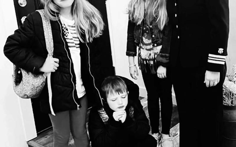 Lt. Commander Veronica Handeland of Timber Lake with her children (L-R) Ella, Liam and Lily on Veterans Day.