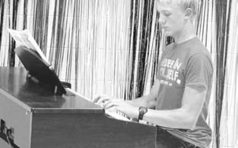 Isaac Zeug performing at the music showcase