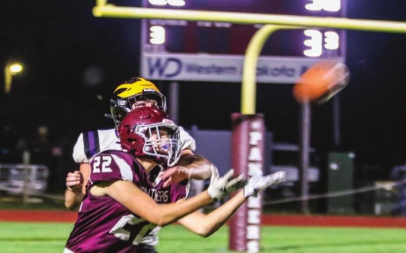Senior Dixon Booth makes a catch against HSA in action earlier this season. Photos by Jon Flatland