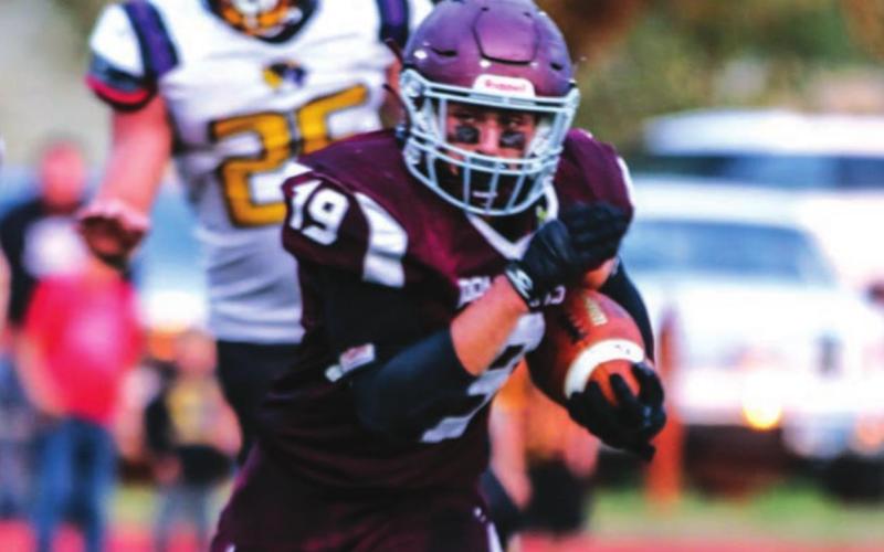 Timber Lake senior running back Jayce Lawrence bolts for daylight in action against the Wolverines.