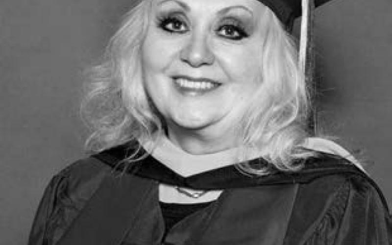 Earns degree