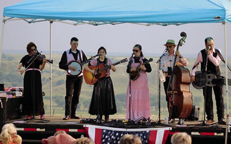 The Triple R Ranch south of Isabel hosted the Georgia-based family bluegrass and gospel band Headin’ Home for two performances on Sunday, July 21. Guests enjoyed a beautiful evening for the outdoors performances with the Moreau River Valley as a backdrop. Photo by Jon Flatland