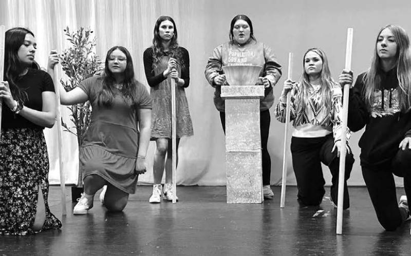 Actors in the Timber Lake High School one-act play, Madea, rehearse a scene where Madea (center, played by Anna Kraft) conjures up a poison to murder her former husband’s new wife. L-R are members of Madea’s chorus: Kessa Bigger, August Laurenz-Anderson, Natalie Lawrence, Katelyn Biegler, and Geana Bollinger. The play will be performed for the local audience on January 20 and enter the regional contest in Ipswich on January 22. Photo by Kathy Nelson