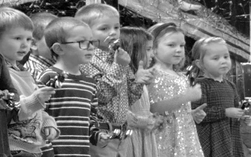 The Holy Cross Kids for Jesus (K4J), under the direction of Cheryl Lawrence and Sarah Schweitzer, presented a Christmas program at St. Joseph Center on December 14. AT RIGHT: Kasmer Lamb, Rowan Bridges, Douglas Kraft, Mayzee Martin, Jessa Aberle, Drew Long.