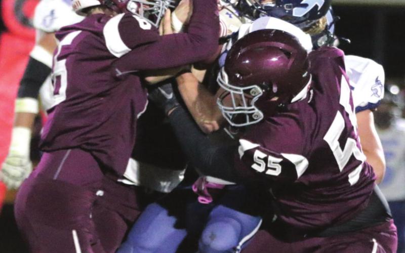 Brady Sandquist (6) and AJ Lindskov (55) crush a Leola ball carrier.
