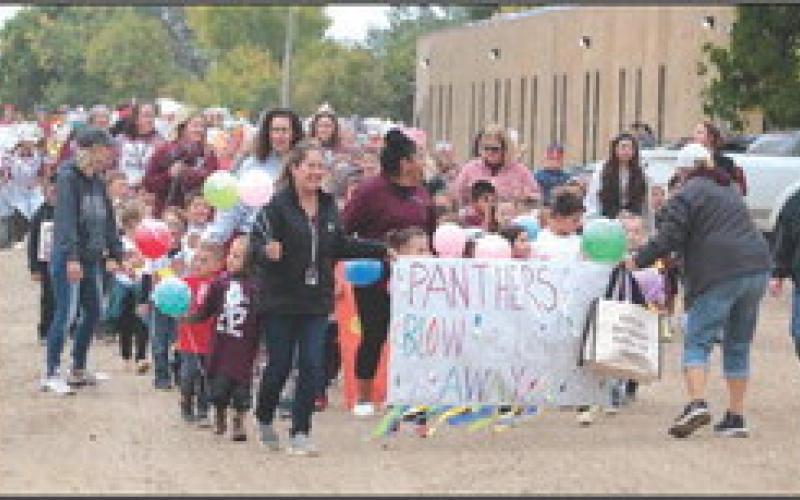 “The Panthers Are So Sweet” was this year’s TLHS Homecoming theme and students produced some really sweet entries for the parade last Friday, Sept. 22. Left, Mrs. Enright and the Pre-K students led the parade from the school to the football field. Above, the winning parade entry was from the fifth grade class with their teachers Mrs. Sandquist and Mrs. Mendoza. Photos by Jon Flatland