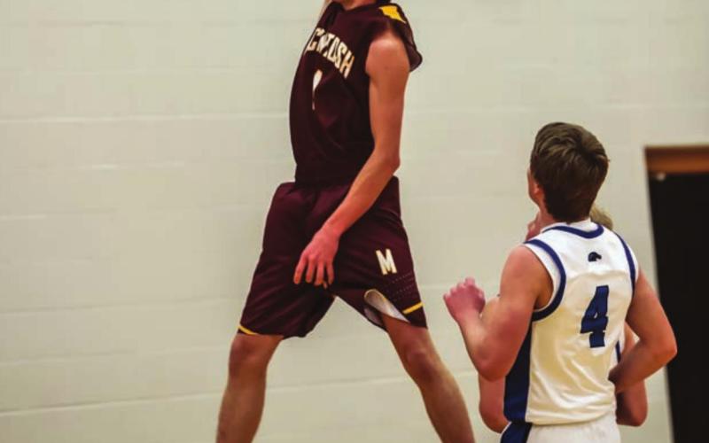 McIntosh senior Zach Bertolotto broke free for a slam dunk versus South Border.