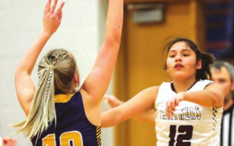 Timber Lake’s Cassie Carter passes to an open teammate.