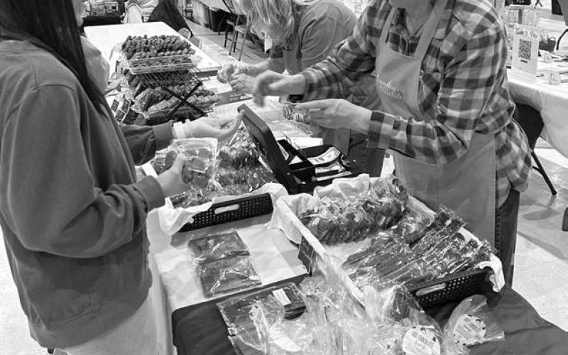 Ann Abel, owner of Grandma’s Chocolates in Lemmon, was among the vendors at the annual Isabel Holiday Craft Fair on Sunday, Dec. 1, at the Isabel Community Center. Abel’s handmade chocolates are a favorite among show shoppers. Photo by Jon Flatland