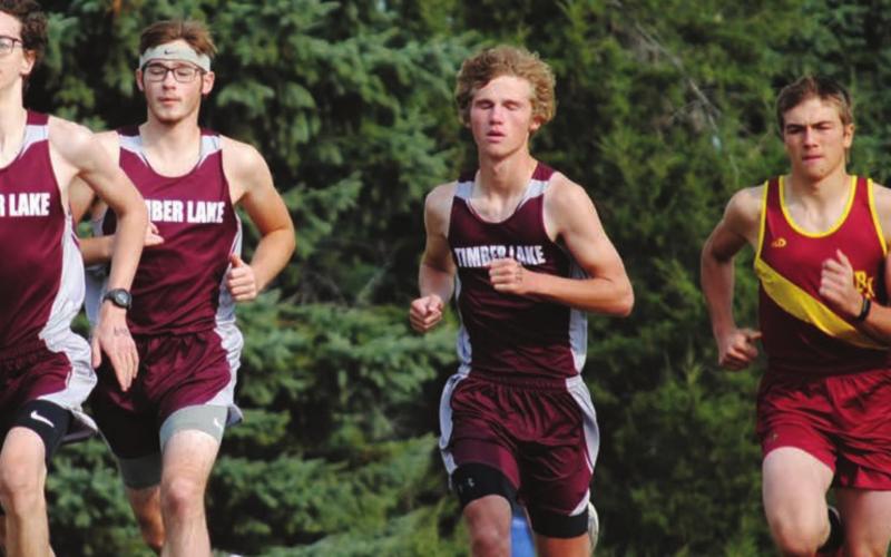 Timber Lake runners (L-R) Ian Beyer, Ethan Farlee and Chase Marshall placed second in the team standings at Gettysburg on Saturday. Photo by Mary Farlee