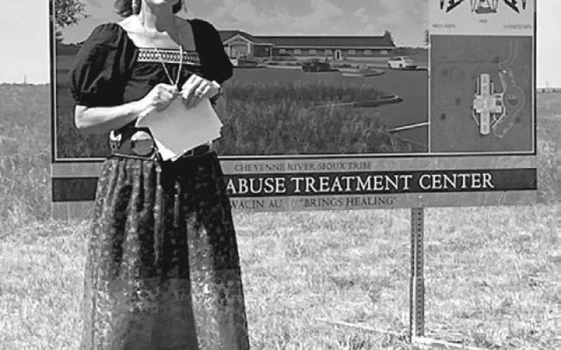 Acting Tribal Health Director for the Cheyenne River Sioux Tribe Molly Longbrake explains the time and effort that went into developing plans for a new substance abuse treatment center in Eagle Butte. CRST officials recently broke ground for the new facility. Photo by Warren LeBeau