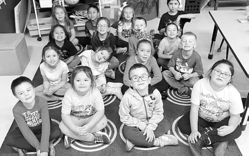 Front row (l-r): Dylan Dupreez, Tempest Smolik, Ryker Bridges, and Blake LeBeau; 2nd row: Rylie Traversie, Ivy Gourneaux, Hanna Crowe, and Lincoln Biegler; 3rd row: Carleisha Red Bear, Azalea Grage, Trevor Aberle, and Ramzi Veit; back row: Charlie Long, Landyn Longbrake, Lakyn Lindskov, and Jacoby Miner-Azure