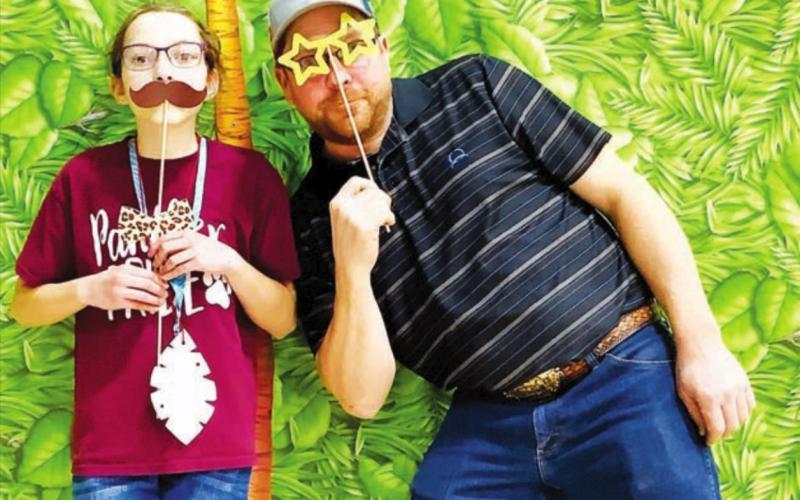 Bricelyn Pederson and her dad, Chad, posed at the photo booth.