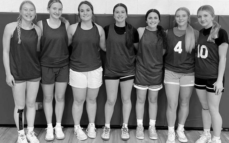 Timber Lake Girls Basketball Head Coach Tuffy Thompson is building his team around seven returning letter winners and an up-and-coming Jr. High program. From left to right are Talley Locken, Paislee Keller, Kate Biegler, Jaylee Schoelerman, Ruby Maher, Madelyn Hermes and Addison Lindskov.