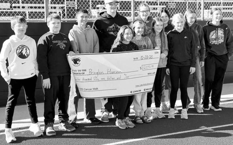Top fundraisers for the Timber Lake Middle School Cancer Walk, pictured with Breylan Hansen, are Front (l-r): Karter Lindskov, Nathaniel O’Bryan, Emmett O’Leary, Remi Wiedmer, River Mowrer, Lily Handeland, Alexa Roggow; Back: Bricelyn Pederson, Pazlin Ducheneaux, Jiel Mowrer, and Cheyienna Nygaard.