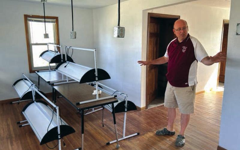 Timber Lake School Supt. Dan Martin inspects the Linderman House after contractors completed converting it into a multi-purpose educational space. Photo by Jon Flatland