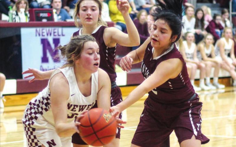 Timber Lake’s Cassie Carter (RIGHT) and Shay Kraft execute the Panthers’ full court press against Newell’s Sydnee Kjellsen in their Region 8B contest last week in Newell. Photo by Jon Flatland
