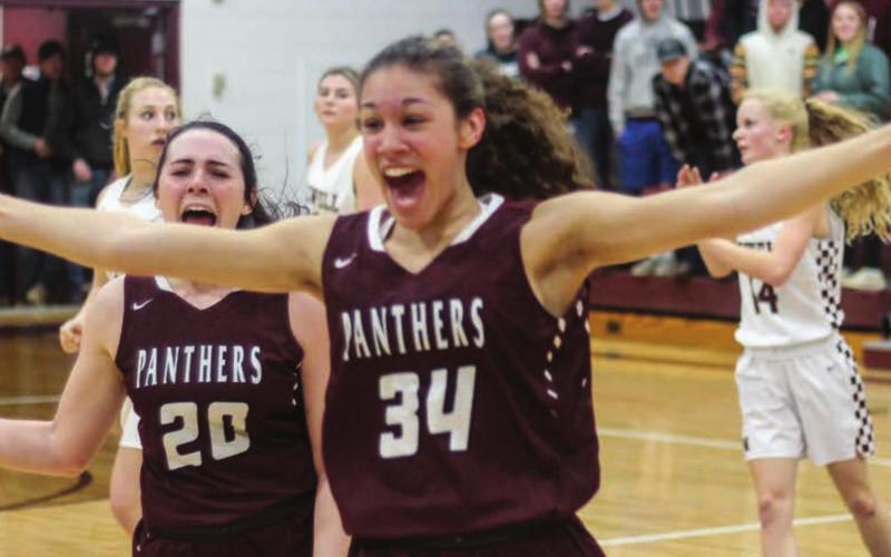 Panthers Maci Maher (20) and Jasmine Nash (34) celebrate their win over Newell and their entry into the SoDak 16 round. Photo by Jon Flatland