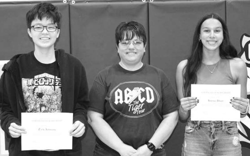 ABOVE: Kayla Farlee (center) presented the DHS Alumni Scholarships to Tate Johnson and Jaysia Starr. Photos by Patty Peacock