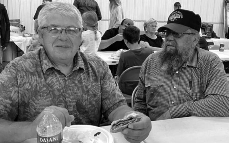 LEFT: Steve Keller and Charles Aberle enjoy the meal. Photos by Kathy Nelson