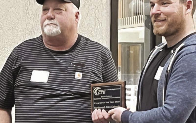 The Northwest Area Schools Welding Technology program was recognized as Program of the Year by the S.D. Technical Education Association (SDTEA) during the group’s annual conference January 30-February 1 in Pierre. Instructor Todd Ludeman (left) was presented with a plaque by SDTEA president Christian Swenson. Ludeman has taught welding in NWAS member schools for 37 years, moving with his mobile classroom to a different school each semester.