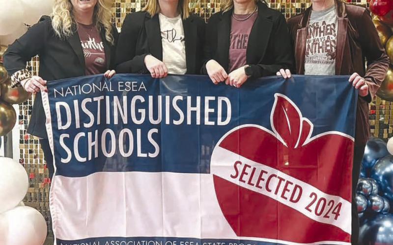 Accepting the National ESEA Distinguished School Award on behalf of the Timber Lake Elementary School at a ceremony in Austin, TX, last week were (l-r) Elementary Principal Danae Paxton, fifth grade teacher Kaitlyn Mendoza, Kindergarten teacher Theresa Keller, and Reading Specialist Alision Nilson.