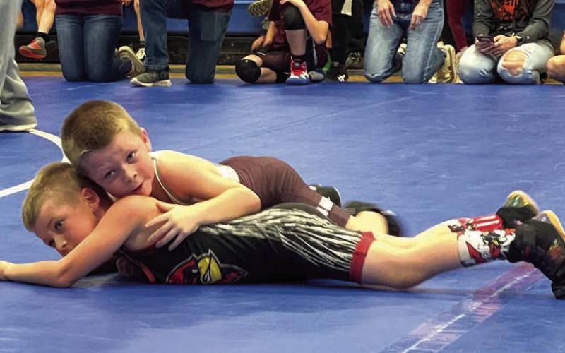 Trevor Aberle, top, of the Timber Lake Youth Wrestling Team, works against an opponent at the Lemmon-McIntosh Youth Wrestling Tournament last Sunday, Feb. 4, in Lemmon. Aberle went 3-0 on the day and captured first place honors in the 5-6 Boys 47-50 B division. Courtesy Photo