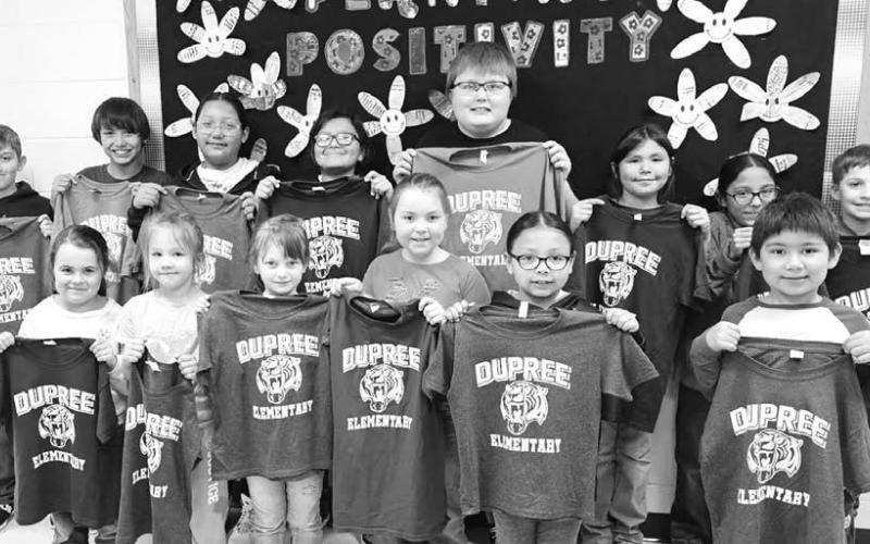 The Dupree Elementary Students of the Month for February use the Lakota virtue of honesty (Wíiyukča) which focuses on truthfulness and being honest in work, admitting mistakes, and upholding integrity. Front (L-R): Harper Jewett, Kayzli Longbrake, Sawyer Holmes, Andrea Jewett, Kiora LaPlante, and Kade Longbrake; back: Kolter Ferguson, Jason Logg, Coco LaPlante, Landen Clown, Braden Dupris, Malaya Marshall, Triton Rave, and Levi Wall. Not pictured: Irene Smart and Justice Weber.