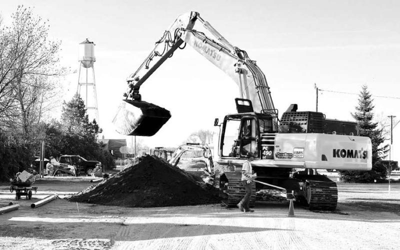 Crow River Construction has resumed work on the Timber Lake City Water Project. Above, the construction crew digs to install new lines on E Street. Photo by Kathy Nelson