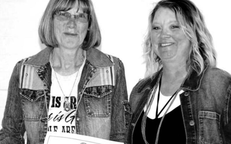 Past DHS Alumni Board member Cindy Longbrake (LEFT) receiving recognition for her many years of service to the DHS Alumni Assoc from DHS Alumni Board member Robyn DePoy..