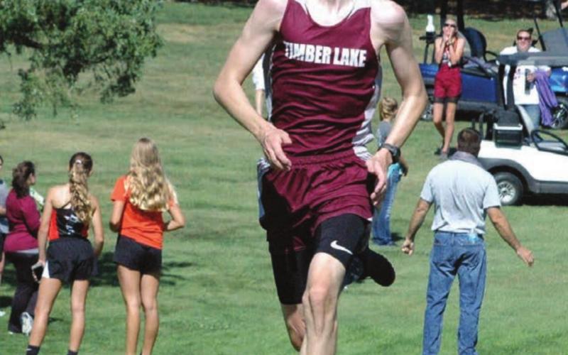 ABOVE RIGHT: Timber Lake’s Ian Beyer ran the LMC course in just over 19 minutes for fifth place overall in the varsity boys competition. Photo by Jon Flatland