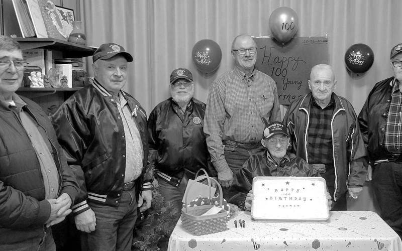 Herman Rosenau of Meadow, who turned 100 on February 13, was honored by the Post 120 American Legion and Auxiliary on February 7. The event was held at the UCC Church in Isabel. Pictured at right are Herman (seated) and American Legion members (l-r) Philip Schwalm, John Dean Boldt, Allen Johnson, Jeff Stradinger, Loris Lindskov, and Darrel Burke.