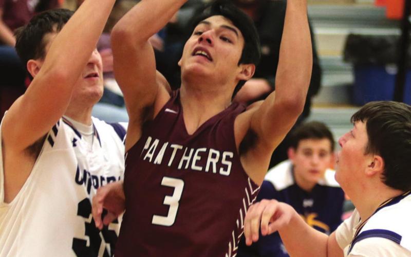Timber Lake senior Chazz Gabe goes up for a shot during the Mobridge Rotary Classic. Photo by Jon Flatland