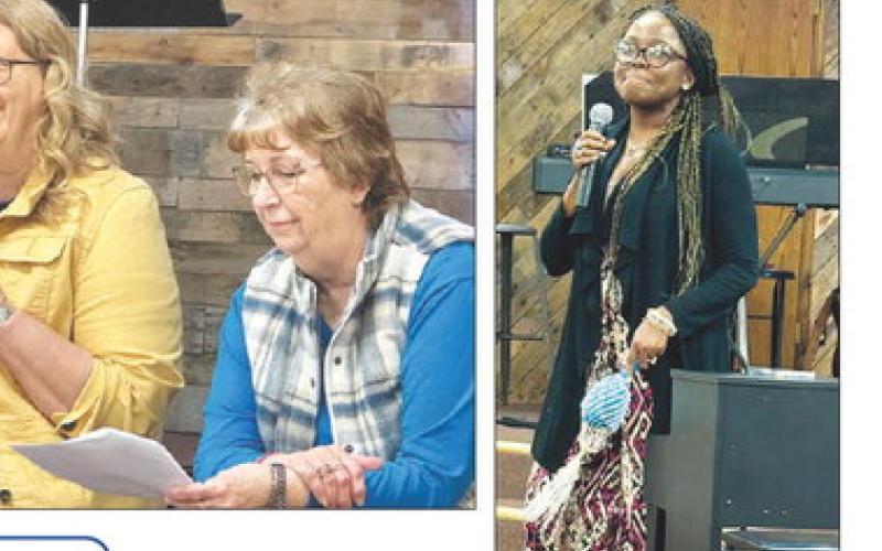 ABOVE: Teri Gayer and Jayne Pfeifle read “The Lord’s Prayer,” while Terry Johnson (off stage) interrupts to answer their prayer as God himself. RIGHT: Lola Hulm led singing of a song from her native Nigeria and gave testimony of the help she received from God as she had successful surgery which relieved her chronic back pain. Photos by Kathy Nelson