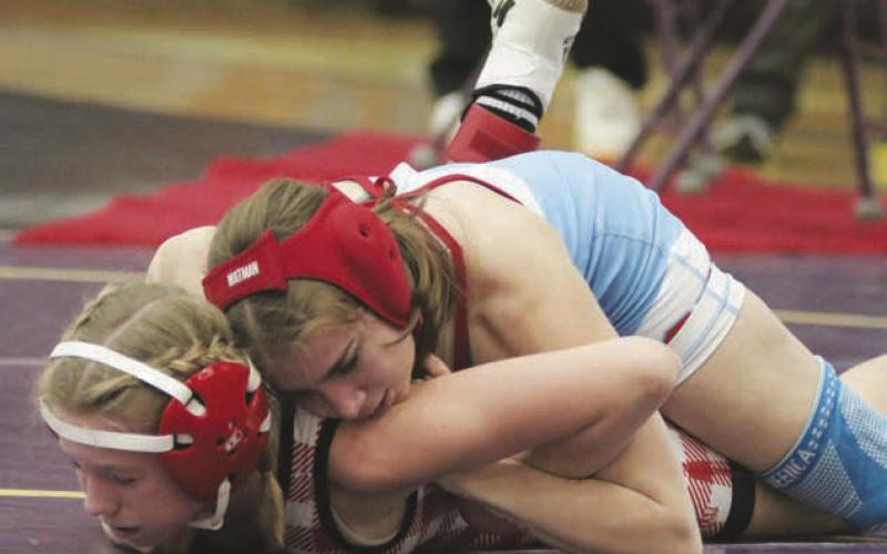 C-EB/Dupree junior Eulayla (Layla) Maynard, top, qualified for her second consecutive SD State High School Wrestling Tournament berth. The defending girls 112-pound champion, Maynard is vying for the title at 106 pounds this year. Photo by Jon Flatland