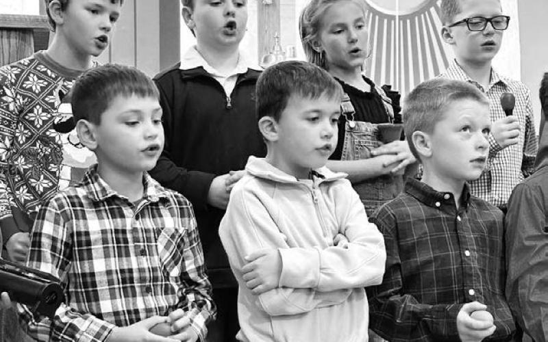 Performing with the K4J children’s choir from Holy Cross Church were (Front, l-r): Zeke Vogel, Bryson Long, Trevor Aberle; and (Back) Brace Beer, Paxton Schweitzer, Joslyn Goldade, and Lincoln Aberle.