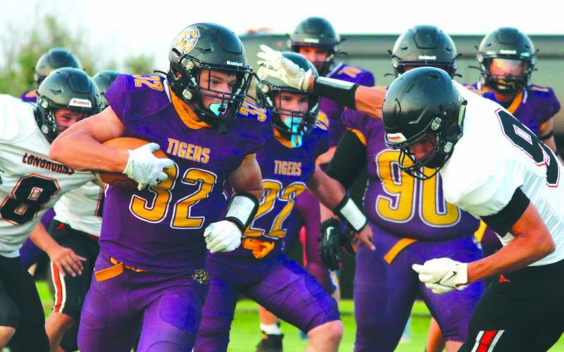 Dupree running back Brayden Terveen-Smith was a plow horse for the Tigers in their football season opener last Thursday, Aug. 17. The junior racked up 187 yards on 15 carries in Dupree’s 42-14 win over Faith. Photo by Patty Peacock