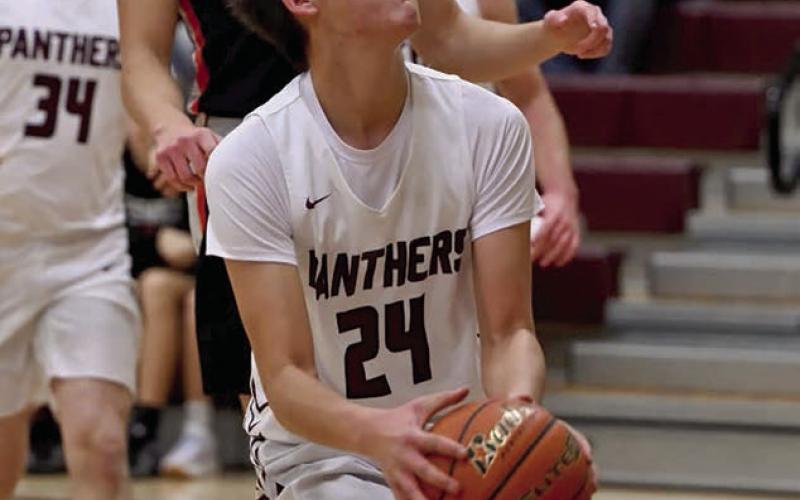 Sophomore Kanton Hunt eyes the hoop on his way to an easy basket off a steal during Timber Lake’s win over Ipswich on Saturday. Photo by Maria DuPreez
