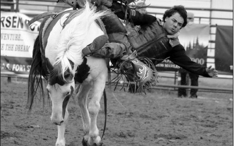 Roy Antrim of Faith gets sideways during the saddle bronc riding event at the SD State 4-H Finals Rodeo.