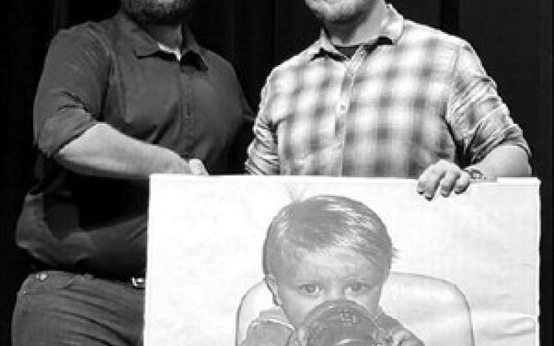 Walker Rose (LEFT) music instructor, presented Shawn Quinn with the 4-year music award.