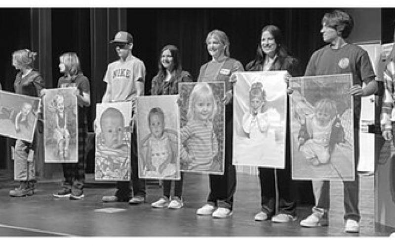 AT LEFT: Timber Lake seniors were honored and presented with posters before the one-act play performance at the school on January 17. L-R are: Natalie Gross, Natalie Biegler, Kendal Lemburg, Wylee Keller, Abby Linderman, Code Enright, Tobi Hintz, Francesco Barbini, Cindy Hoyt. Photos by Kathy Nelson