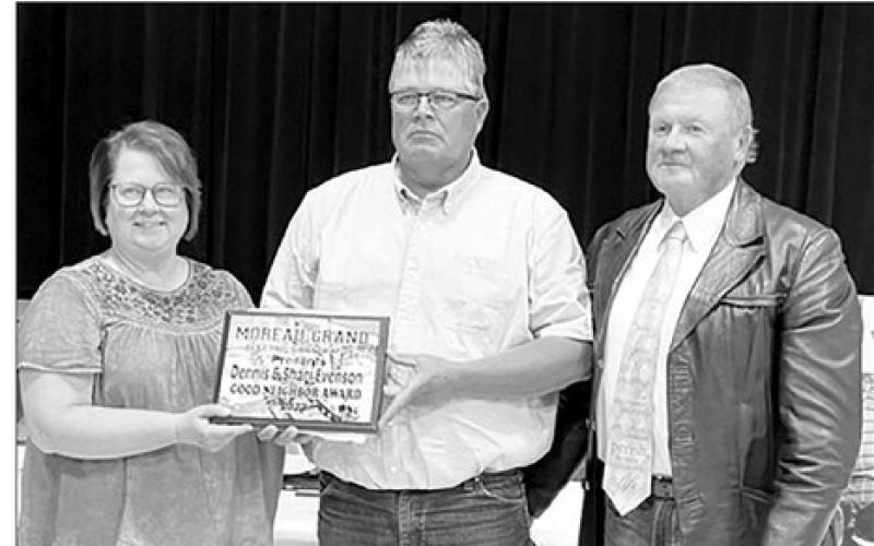 ABOVE: Dennis and Shari Evenson of McIntosh received the 2022 Good Neighbor Award, which was presented by board member Royce Walker (RIGHT).